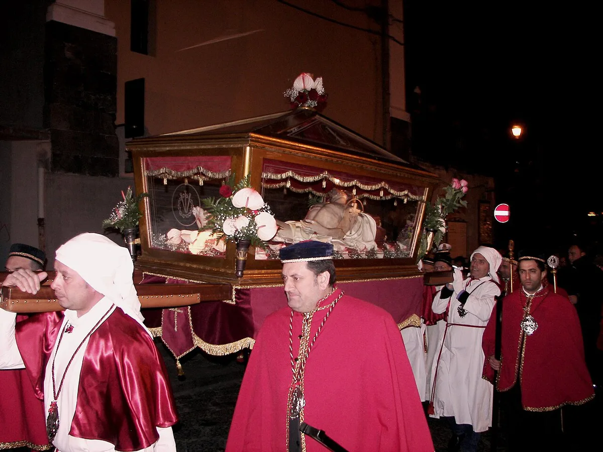 Good Friday procession with hooded figures during Holy Week in Italy — 1