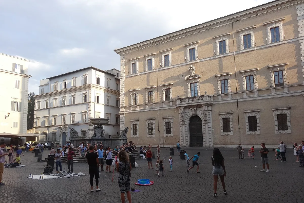 Piazza di Santa Maria in Trastevere with its basilica and fountain