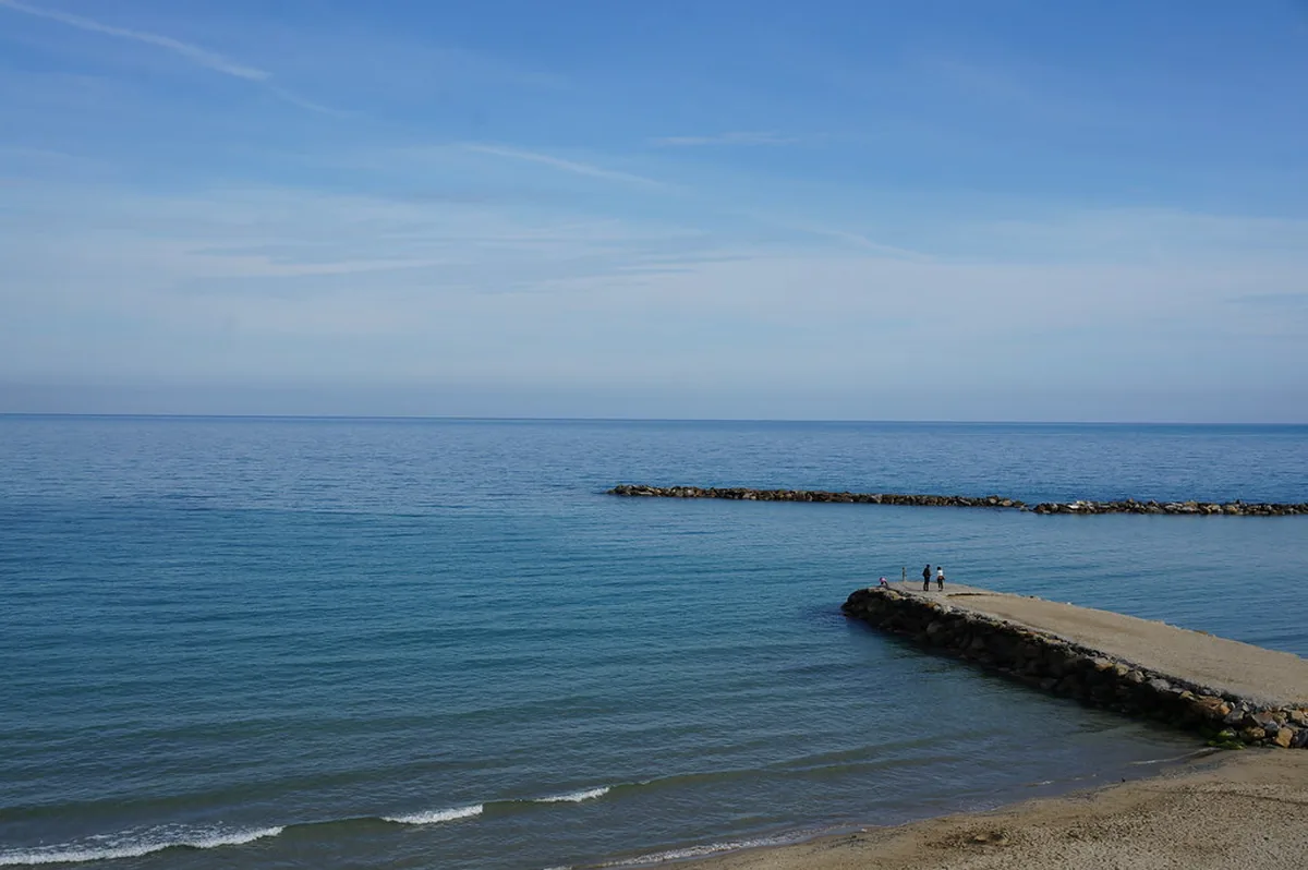 Calm blue Ligurian Sea beside the waterfront near Sanremo